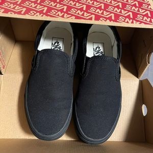 Vans classic black out slip ons